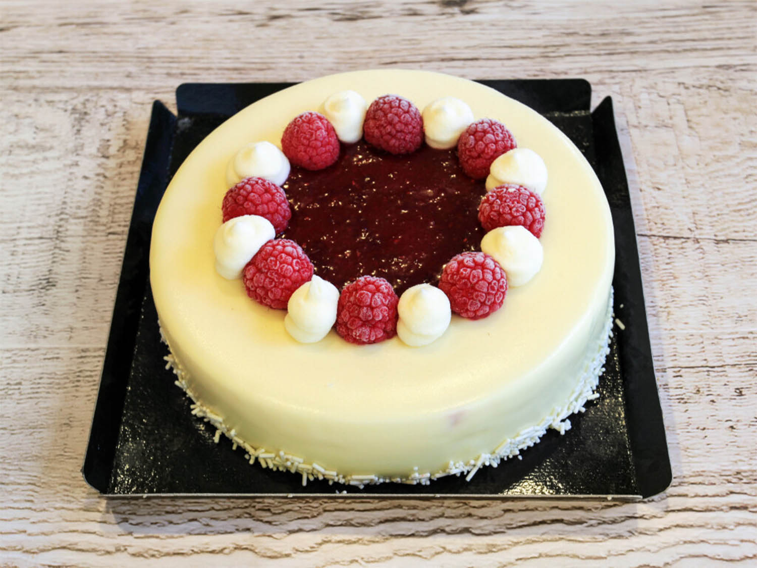 Tarta de queso con frambuesa y chocolate blanco_Food_La Panotecca en madrid_restaurante tartas y dulces en Madrid